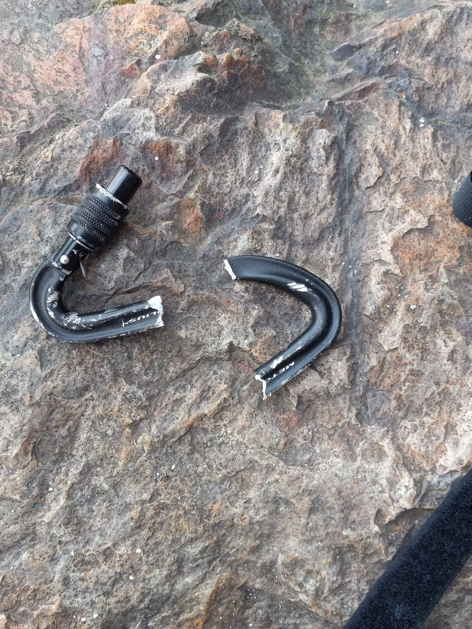 broken carabiner pieces